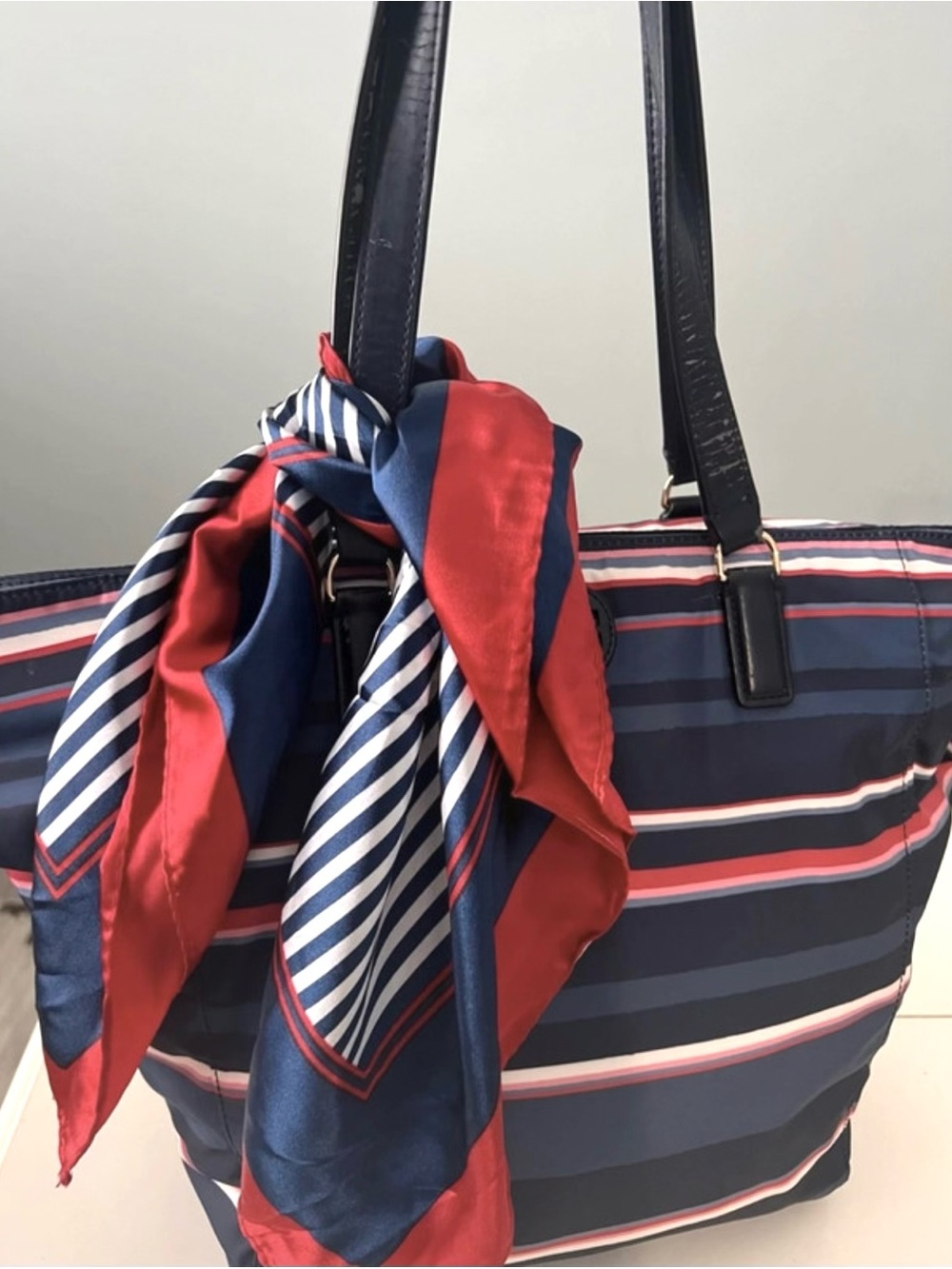 Tory Burch Nylon Stripe
Zipper Tote Navy with red & navy comes with a scarf